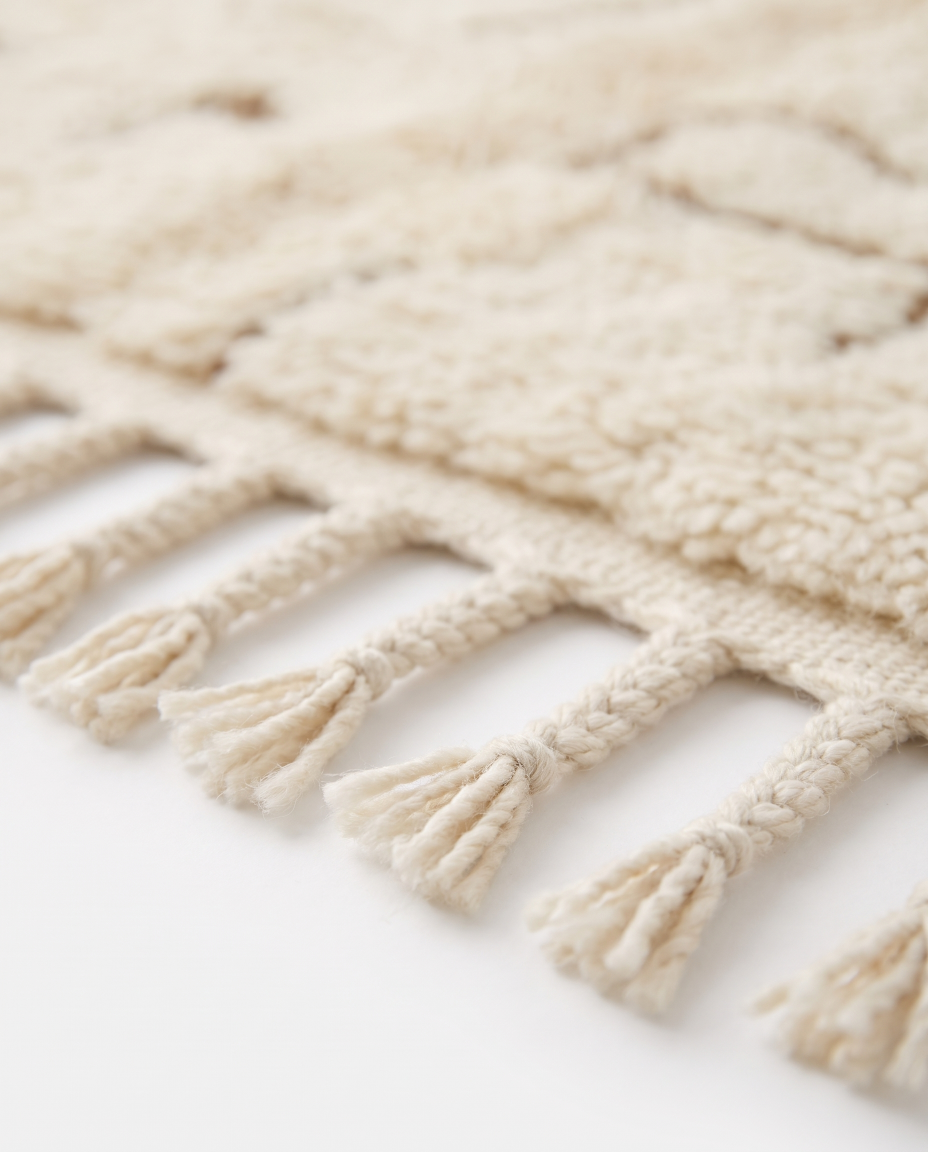 Desert lines Azilal rug fringe detail on white studio background