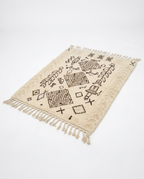 Tribal tales Azilal rug full view at an angle on white studio background