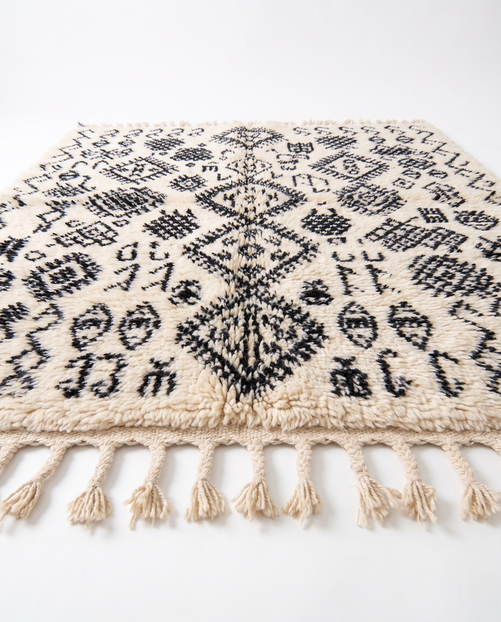 Berber script Azilal rug side view on white studio background