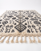 Berber script Azilal rug side view on white studio background