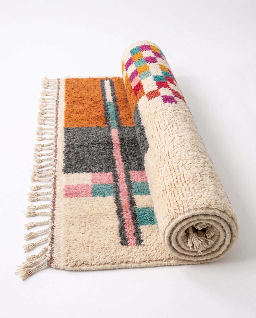 Terracotta Blocks Beni Ourain rug half-rolled on white studio background