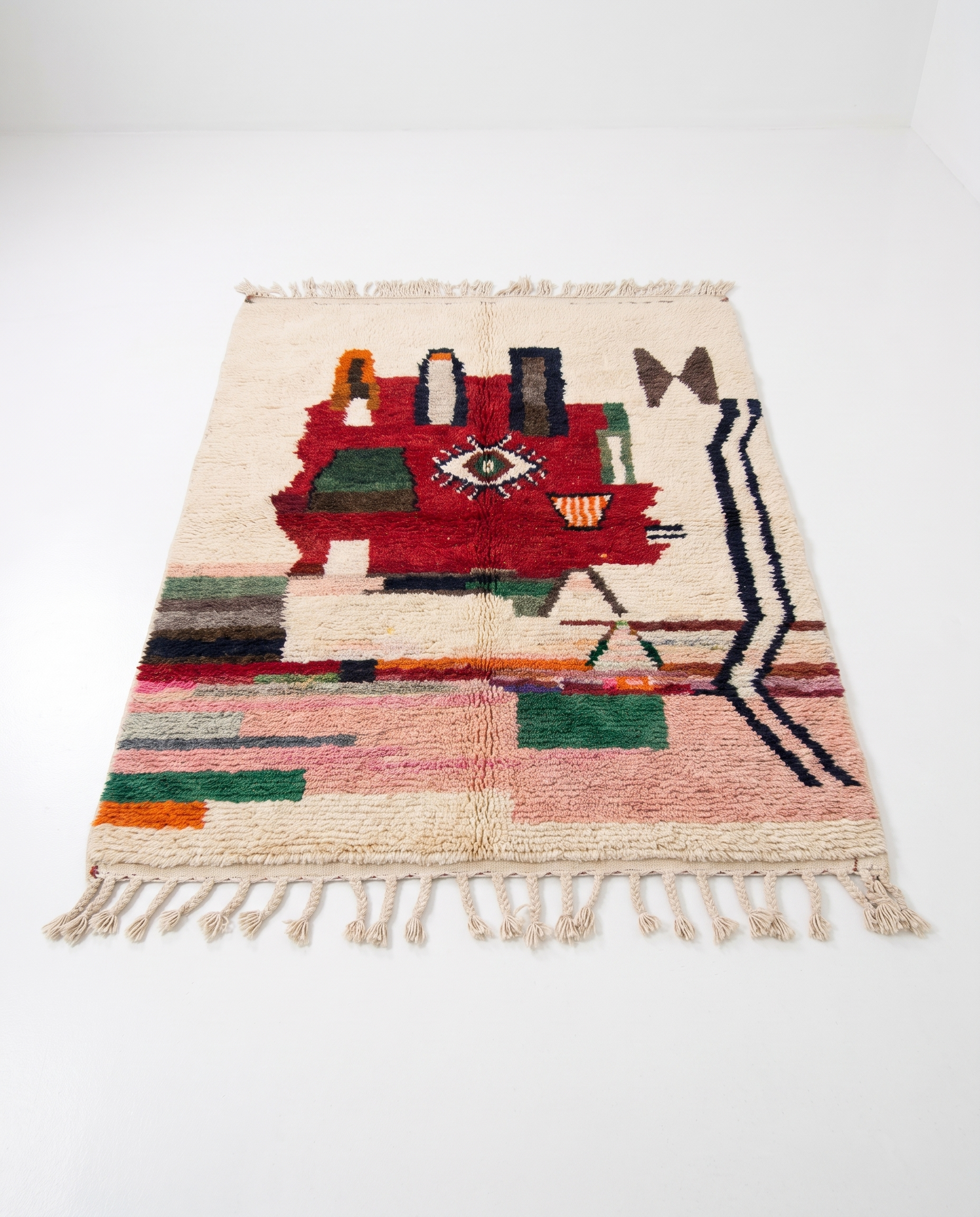 Berber Eye Beni Ourain rug full view at an angle on white studio background