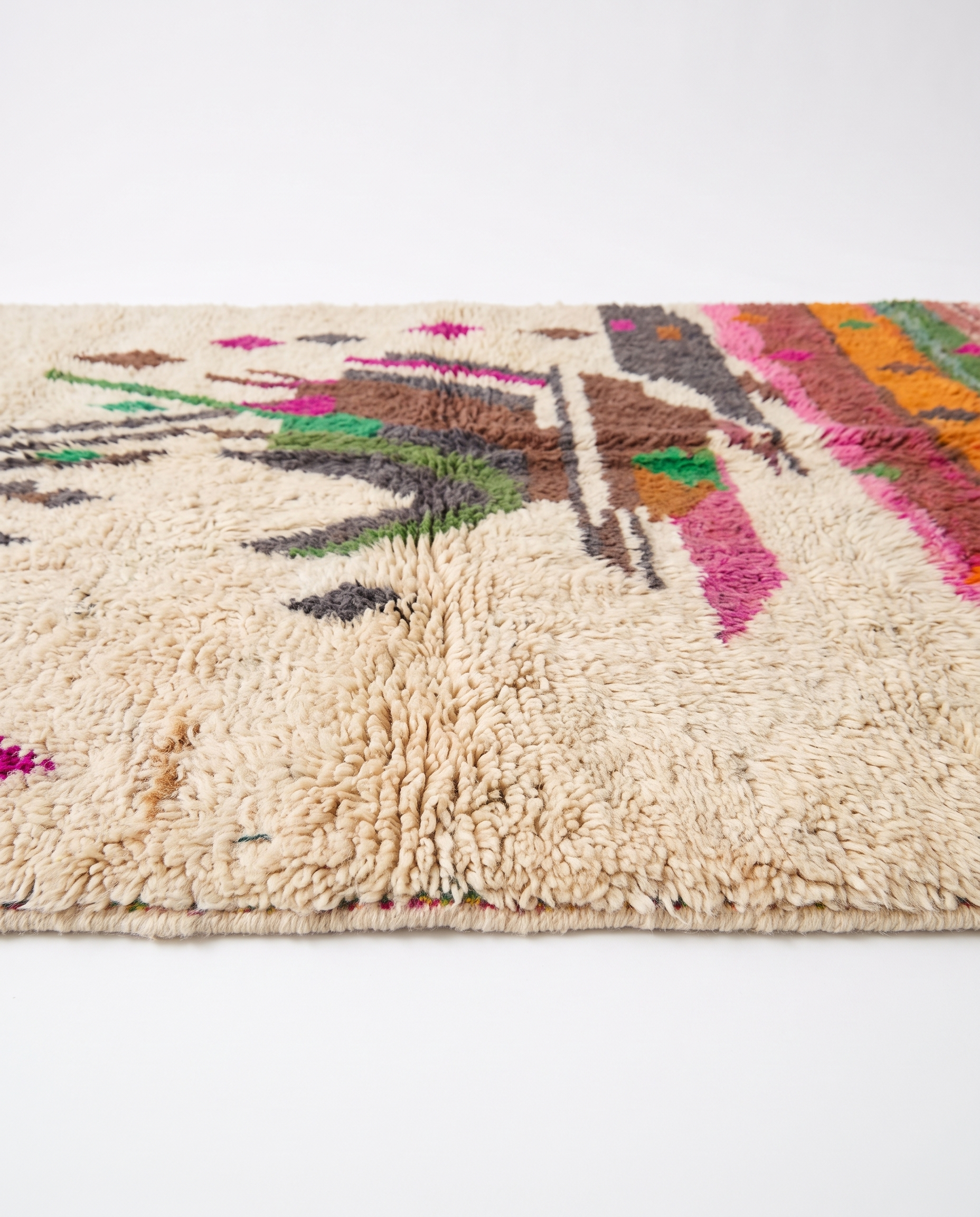 Atlas Bird Beni Ourain rug side view on white studio background