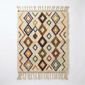 Jewel Lattice Azilal rug, handwoven wool with red, blue, green and mustard diamonds, flat lay top view