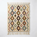 Jewel Lattice Azilal rug, handwoven wool with red, blue, green and mustard diamonds, flat lay top view