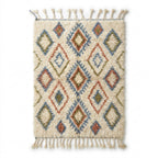 Lattice Earth Azilal rug, handwoven wool with a terracotta, blue and green diamond lattice, flat lay top view