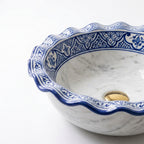 Marble and Blue Wave Moroccan ceramic sink - macro of blue and white rim detail
