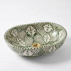 Olive Fessi Moroccan ceramic sink - close-up of hand-painted green motifs