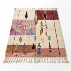 Plum Fields Boujaad rug, handwoven wool with saturated purple, brown, mauve and pink color blocks, flat lay top view
