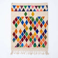 Prism Diamonds Azilal rug, handwoven wool with multicolor diamonds and triangles, flat lay top view