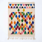 Prism Diamonds Azilal rug, handwoven wool with multicolor diamonds and triangles, flat lay top view