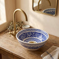 Royal Blue Medallion Moroccan ceramic vessel sink styled on a bathroom counter in a Moroccan-inspired setting