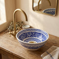 Royal Blue Medallion Moroccan ceramic vessel sink styled on a bathroom counter in a Moroccan-inspired setting