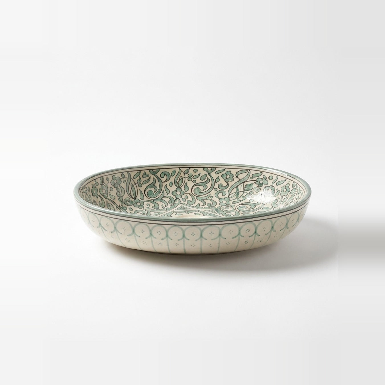 Sage Star Garden Moroccan ceramic vessel sink - sage green floral vines around an eight-point star with brass drain