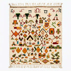 Spice Market Azilal rug, handwoven wool with orange, green, pink, blue and red tribal symbols, flat lay top view