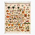 Spice Market Azilal rug, handwoven wool with orange, green, pink, blue and red tribal symbols, flat lay top view