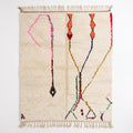 Whisper Lines Azilal rug, handwoven wool with sparse pink, orange, red and blue line motifs, flat lay top view