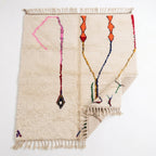 Whisper Lines Azilal rug — folded corner showing plush pile depth