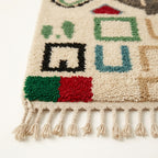Wild Symbols Azilal rug — hand-knotted fringe detail close-up