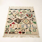 Wild Symbols Azilal rug — full rug on white studio background