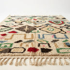 Wild Symbols Azilal rug — full rug on white studio background