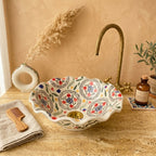 Wildflower Ruffle Moroccan ceramic vessel sink styled on a bathroom counter in a Moroccan-inspired setting