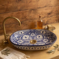 Zellige Arabesque Blue Moroccan ceramic vessel sink styled on a bathroom counter in a Moroccan-inspired setting